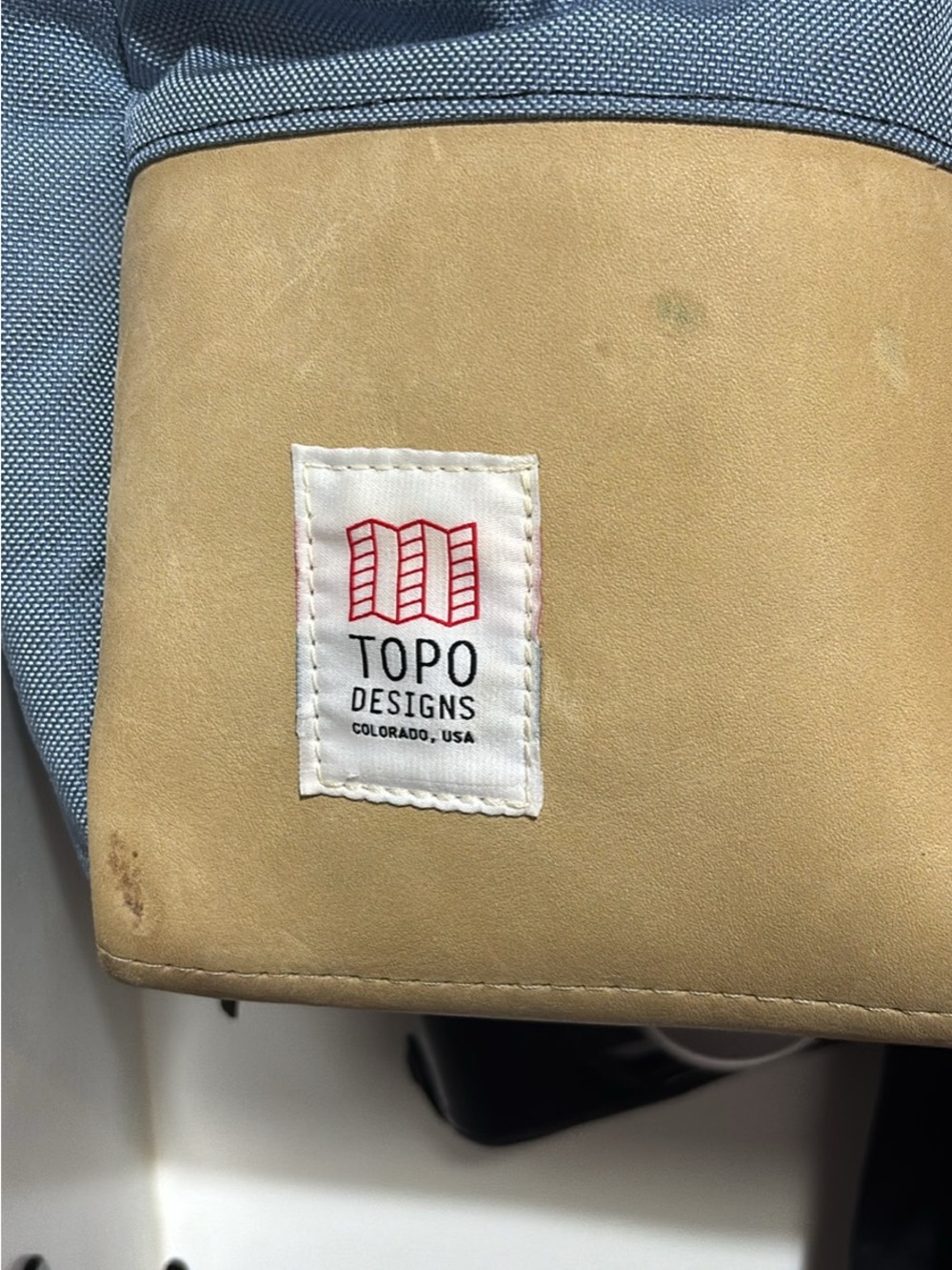 Topo Designs Blue Canvas Backpack with Tan Leather Base